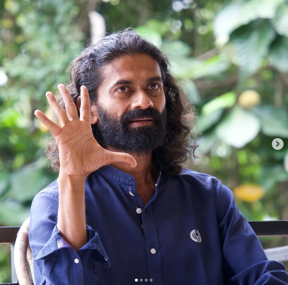 Manish_Pole_speaking_blue_shirt_-_Manish_Pole